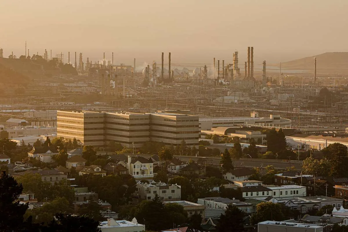 Richmond, CA buildings and the bay at dusk